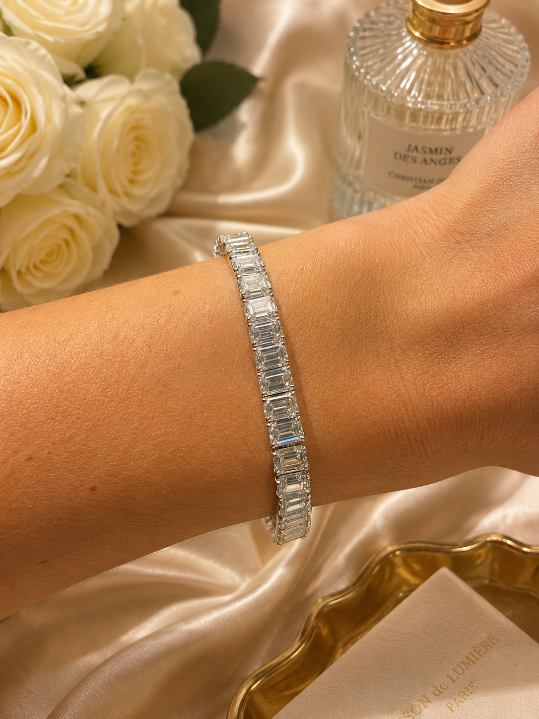 Emerald cut tennis bracelet with sparkling gemstones, crafted by Appleby Jewellers Dublin, showcasing elegant jewelry design.