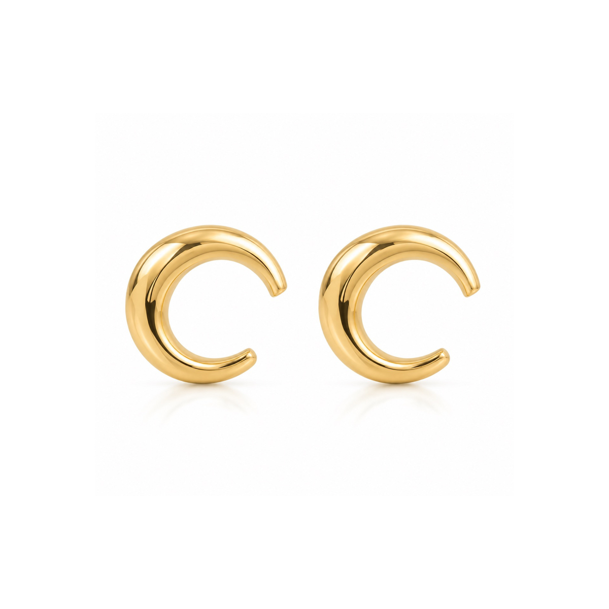 14ct gold sculpted crescent hoop earrings from Appleby Jewellers Dublin, featuring a smooth, curved design in gold.