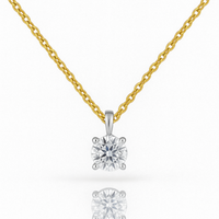 18ct white gold solitaire diamond pendant on yellow gold chain, elegant jewelry piece with a sparkling diamond from Appleby Jewellers Dublin.