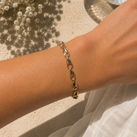 Gold infinity chain bracelet from Appleby Jewellers Dublin, featuring a round link design and elegant gold finish.