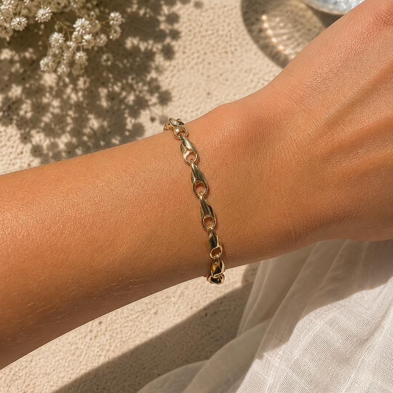 Gold infinity chain bracelet from Appleby Jewellers Dublin, featuring a round link design and elegant gold finish.