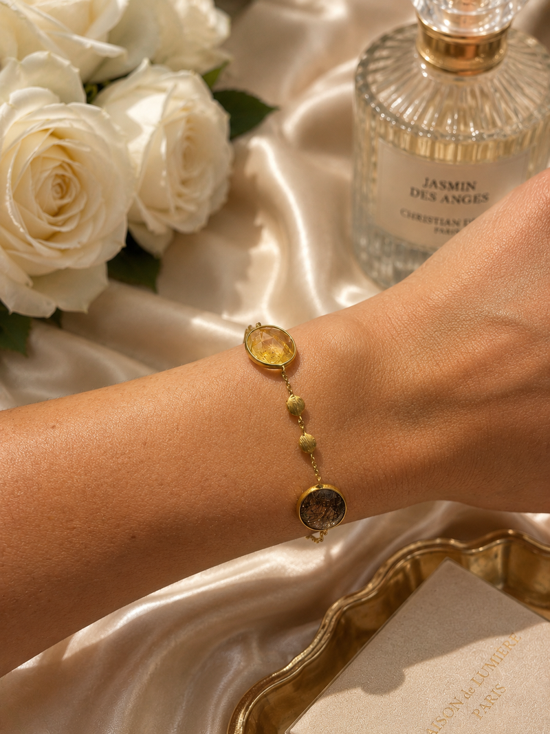 14ct gold quartz bracelet featuring a sleek design with a gold band and a polished quartz stone, styled by Appleby Jewellers Dublin.