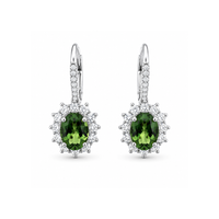 Green sapphire and diamond earrings by Appleby Jewellers Dublin, featuring vibrant green sapphires and sparkling diamonds.
