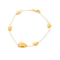 18ct gold bead pebble bracelet with green sapphire accents from Appleby Jewellers Dublin, featuring a delicate and elegant design.