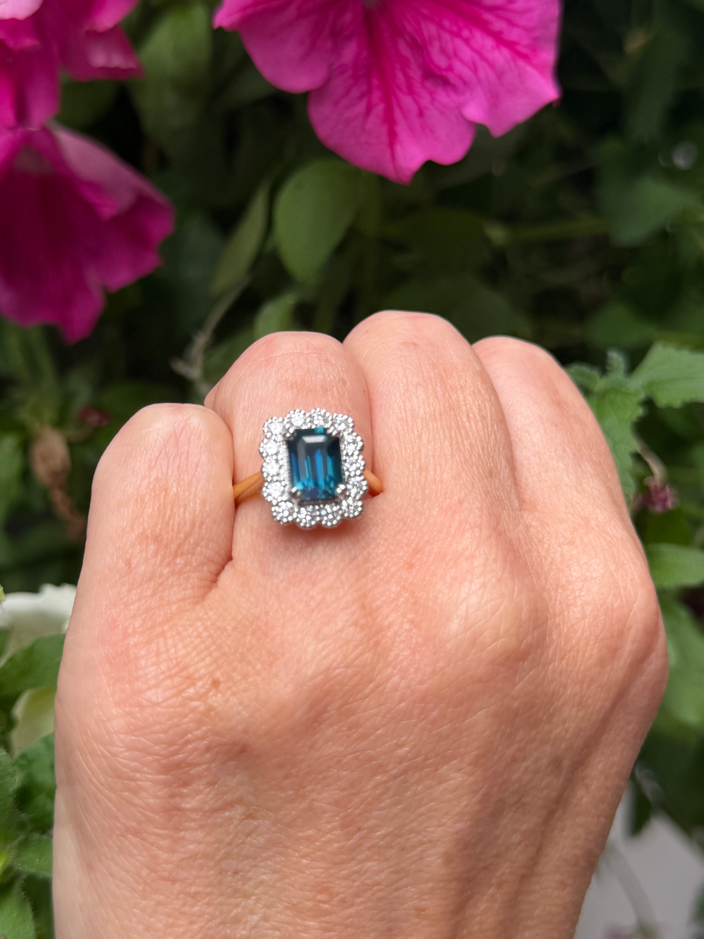 The Flower Ring - Emerald Cut Teal Sapphire