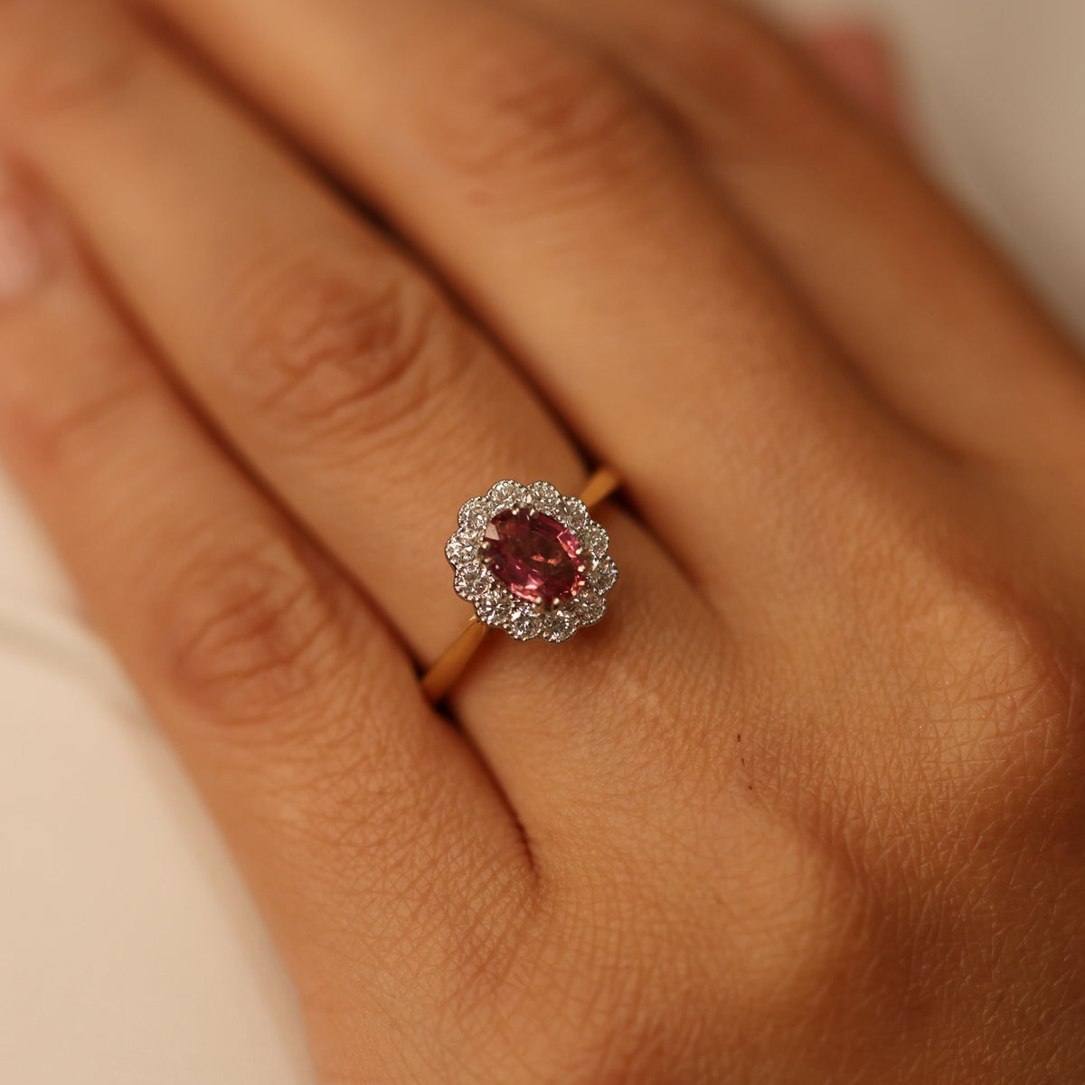 Pink Padparadscha sapphire diamond ring by Appleby Jewellers Dublin featuring a delicate pink gemstone set in a elegant band.