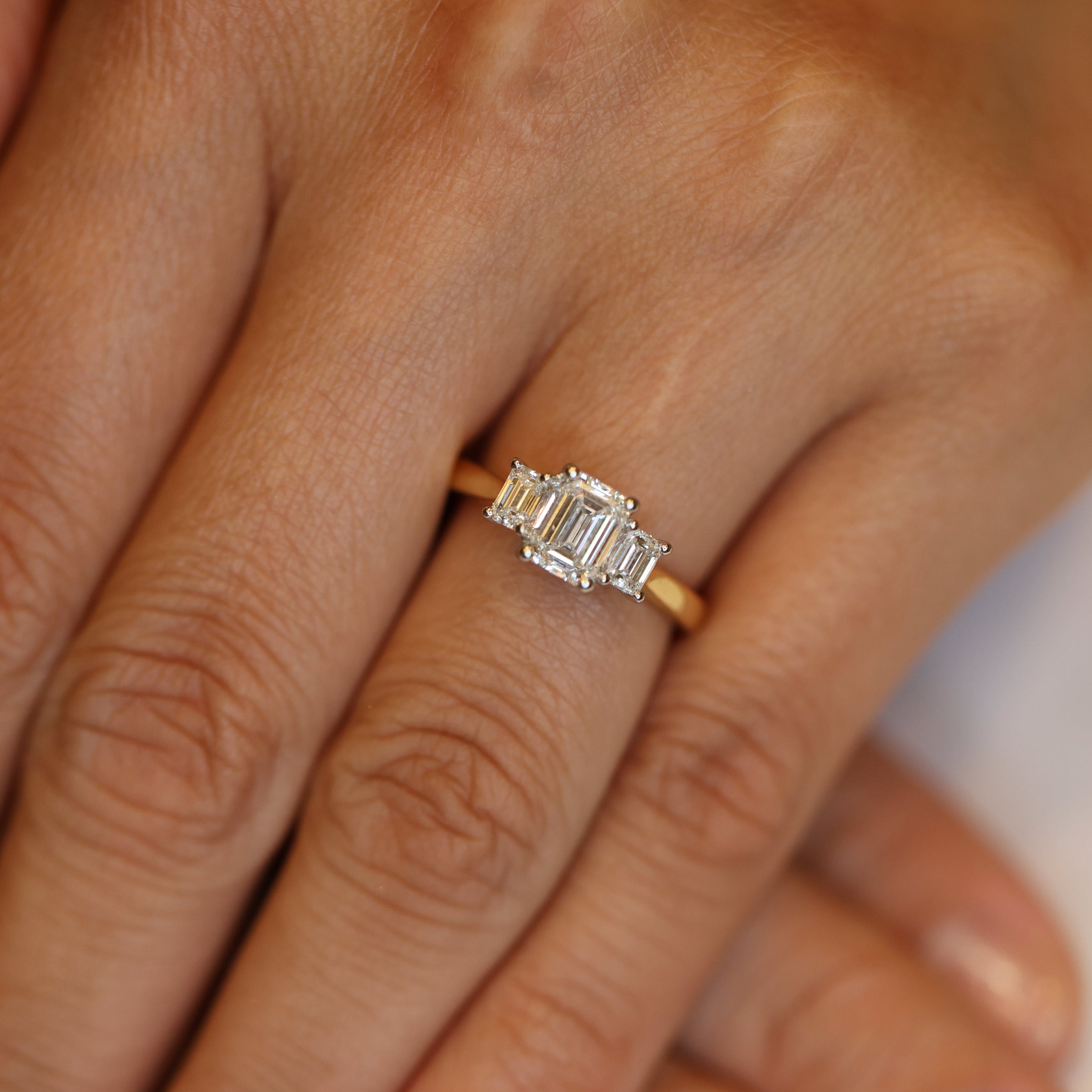 Emerald Cut Trilogy Engagement Ring