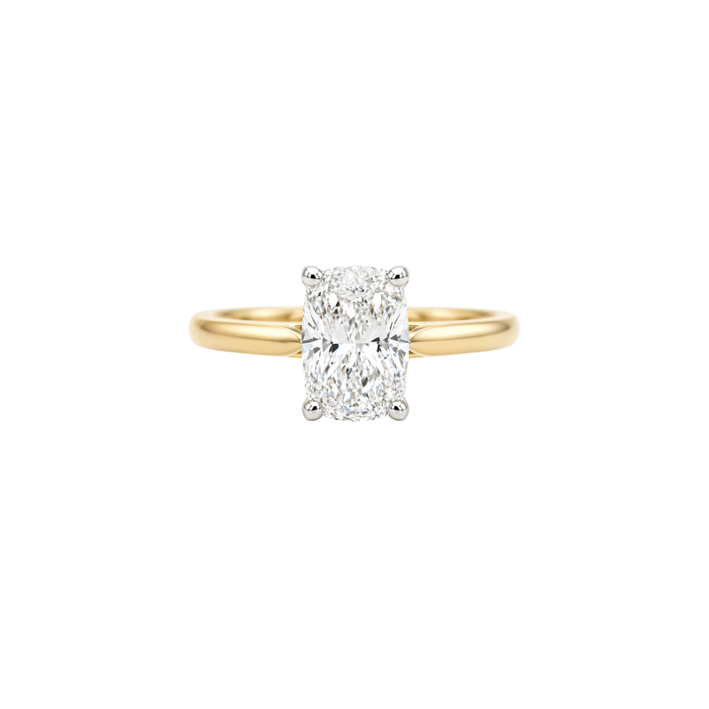 Cushion cut 1.00ct diamond solitaire ring by Appleby Jewellers Dublin with a simple gold band.