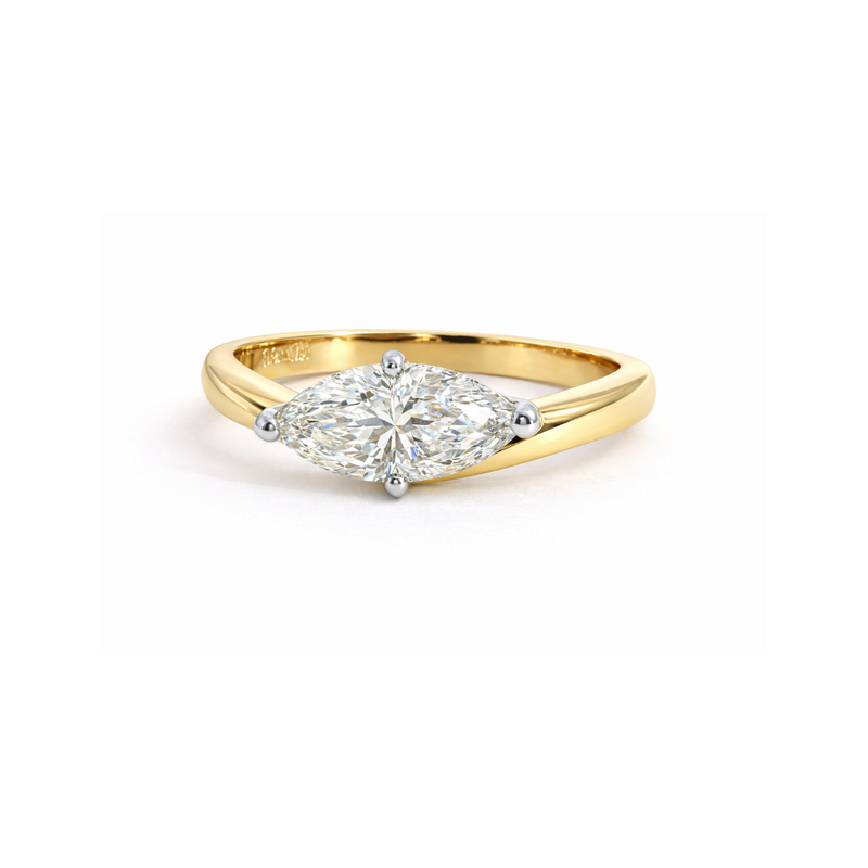 Marquise Wave Diamond Ring by Appleby Jewellers Dublin featuring a sleek gold band and marquise-cut diamonds.