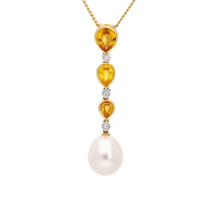Oval-shaped golden sunrise pearl pendant necklace by Appleby Jewellers Dublin, showcasing a luminous pearl on a delicate chain.