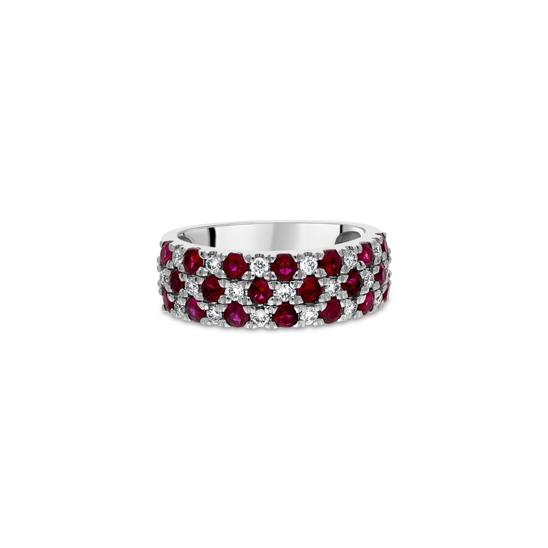 Platinum "Profile" ruby and diamond pavé-set band ring by Appleby Jewellers Dublin, showcasing intricate gemstone settings and elegant design.