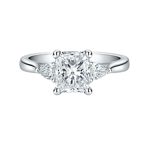 Diamond ring with a central square-cut diamond and smaller round diamonds on a white background