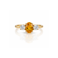 Elegant Tangerine Sapphire ring featuring a vibrant orange sapphire set in a stylish diamond ring by Appleby Jewellers Dublin.