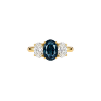 Teal sapphire and diamond trilogy ring featuring three stones set in a sleek band, crafted by Appleby Jewellers Dublin.