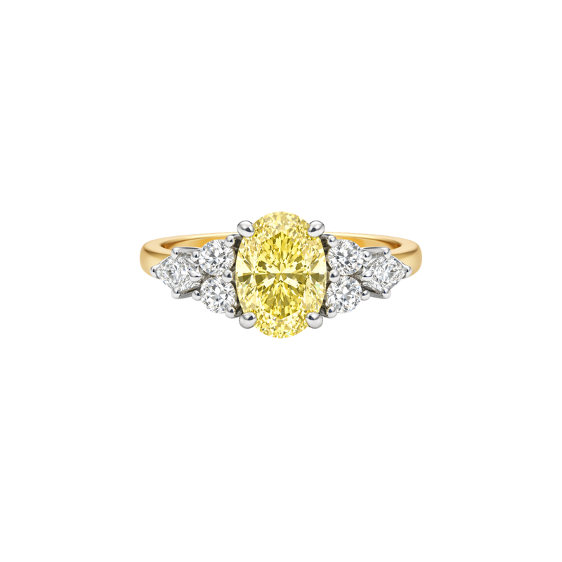 Yellow diamond ring called The Aura by Appleby Jewellers Dublin featuring a vibrant yellow diamond set in a sleek ring design.
