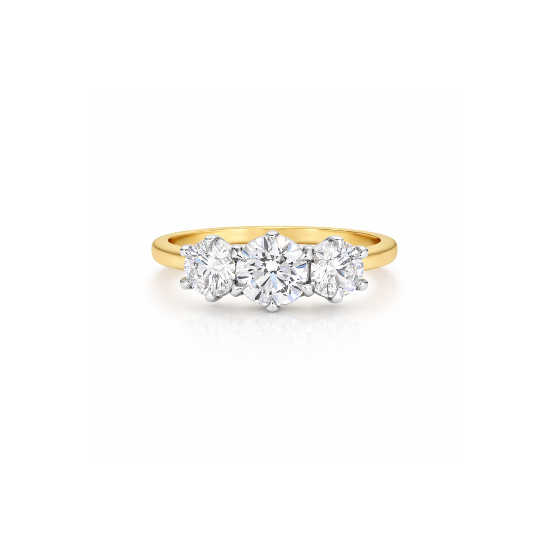 Three elegant diamond rings from the Rose Trilogy by Appleby Jewellers Dublin, showcasing sparkling stones and intricate band designs.
