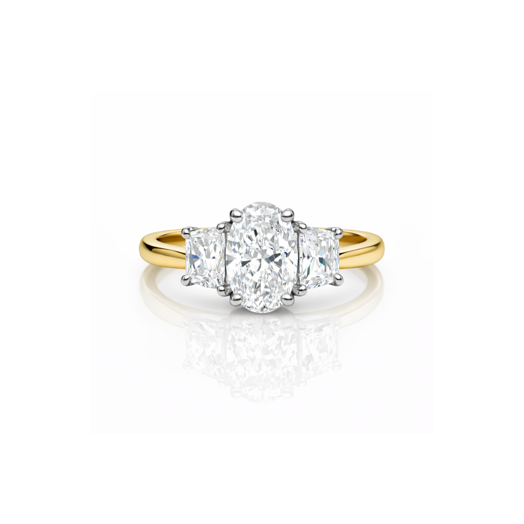 Elegant diamond ring featuring oval and trapezoid shapes by Appleby Jewellers Dublin, showcasing intricate design and sparkling gemstones.