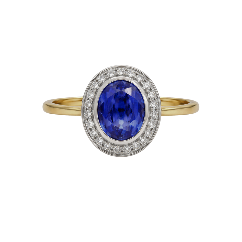 Close-up of the 'Corrine' blue sapphire ring featuring a central sapphire gemstone set in a delicate diamond ring from Appleby Jewellers Dublin.