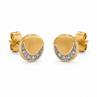A pair of gold crescent moon stud earrings with a row of small clear pavé stones along the inner curve, shown on a plain white background.