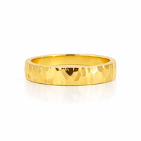 18ct gold hammered edge wedding band, 5mm width, crafted by Appleby Jewellers Dublin, showcasing textured hammered finish.