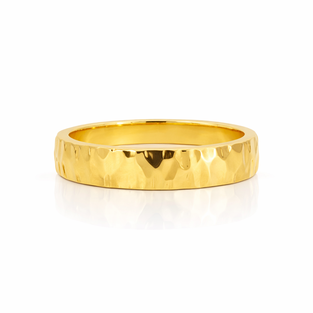 18ct gold hammered edge wedding band, 5mm width, crafted by Appleby Jewellers Dublin, showcasing textured hammered finish.