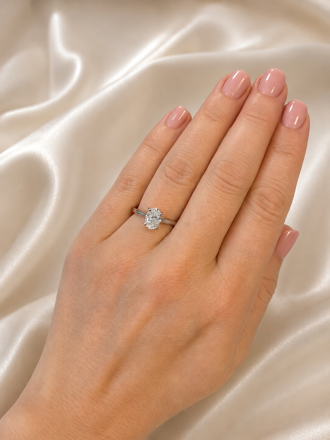 Diamond oval engagement ring with 1.00ct center stone from Appleby Jewellers Dublin, showcasing the elegant design and sparkling diamond.