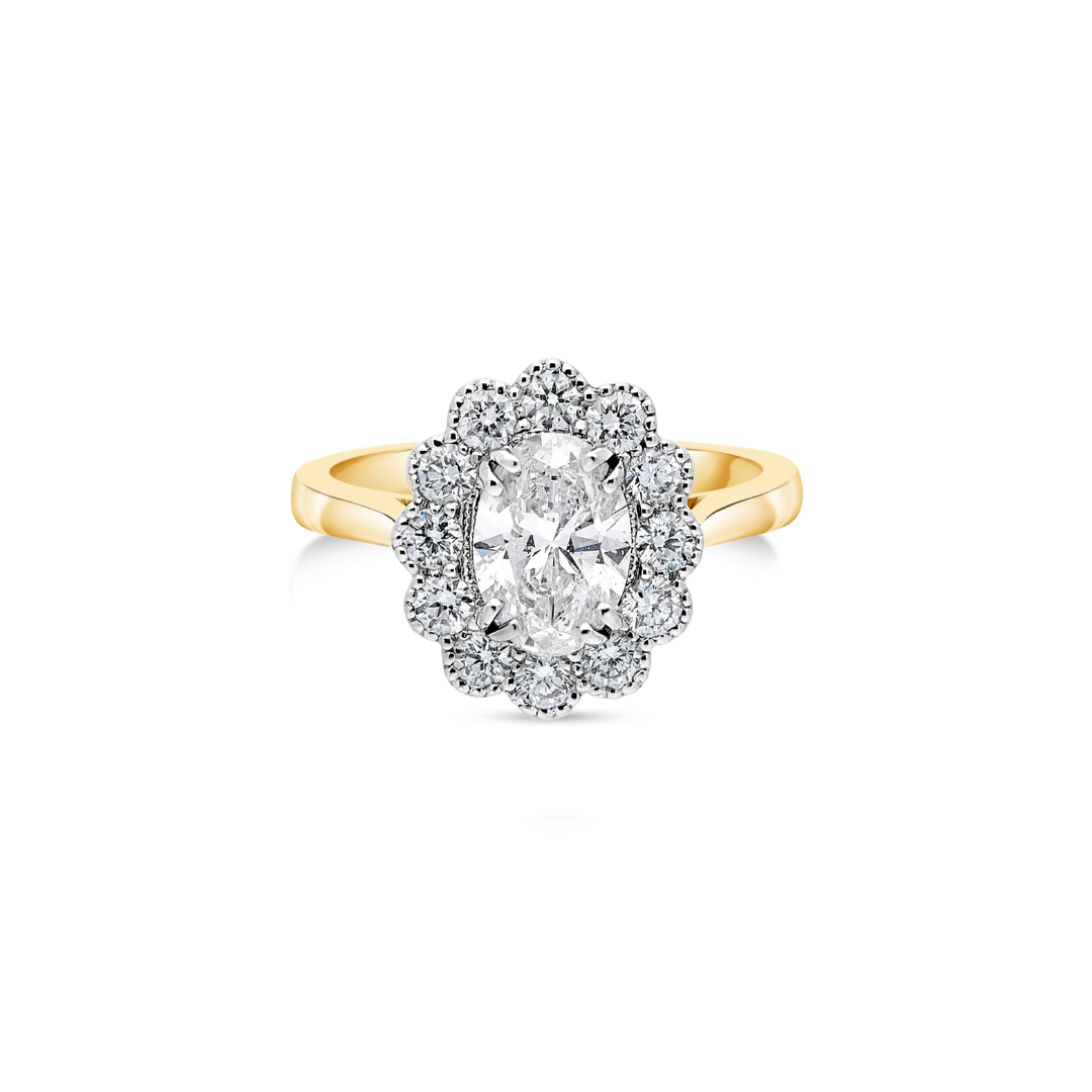 Diamond flower ring by Appleby Jewellers Dublin featuring intricate floral design and sparkling gemstones.