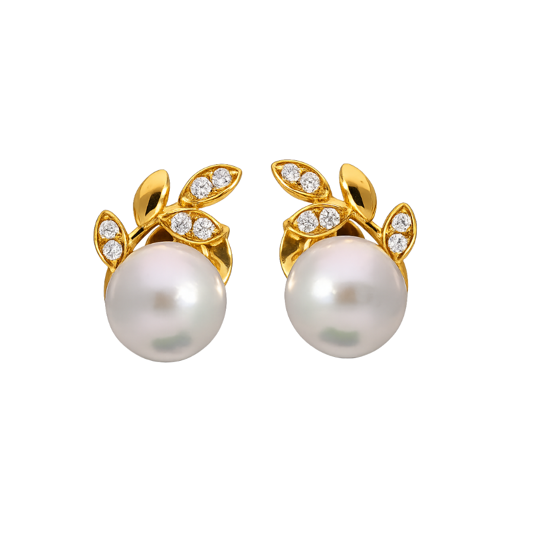 Elegant pearl and diamond stud earrings by Appleby Jewellers Dublin, featuring a classic design and sparkling gemstones.