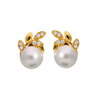 Elegant pearl and diamond stud earrings by Appleby Jewellers Dublin, featuring a classic design and sparkling gemstones.