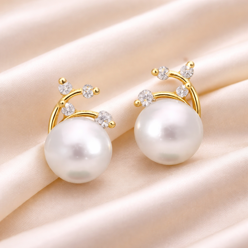Pearl and diamond stud earrings from Appleby Jewellers Dublin, featuring elegant design with shimmering pearls and sparkling diamonds.