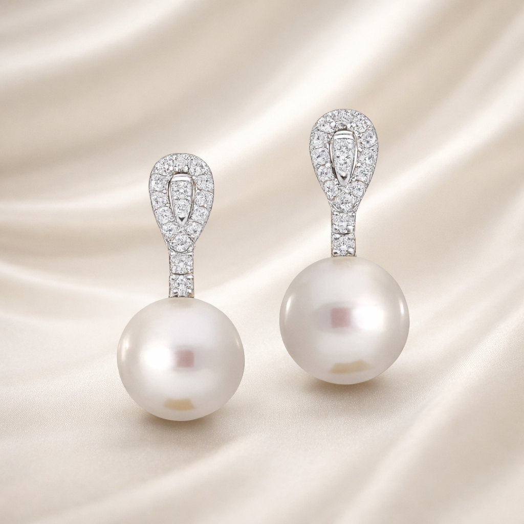 Elegant South Sea pearl and diamond drop earrings by Appleby Jewellers Dublin featuring luxurious design and sparkling accents.