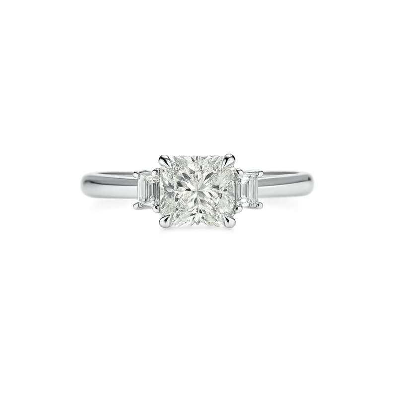 Elegant Tranquility Radiant diamond ring with trapeze diamonds from Appleby Jewellers Dublin, showcasing sparkling gemstone setting.