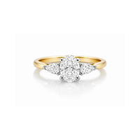 Elegant diamond ring featuring a tranquil oval center stone with pear-shaped side accents, crafted by Appleby Jewellers Dublin.