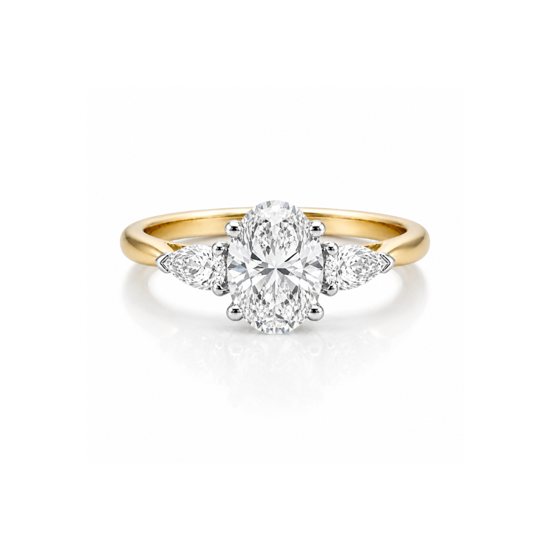 Diamond ring with pear-shaped side stones, 2.00ct total, elegant design by Appleby Jewellers Dublin.