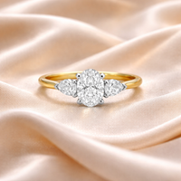 Elegant diamond ring featuring an oval center stone with pear-shaped side accents, crafted by Appleby Jewellers Dublin.