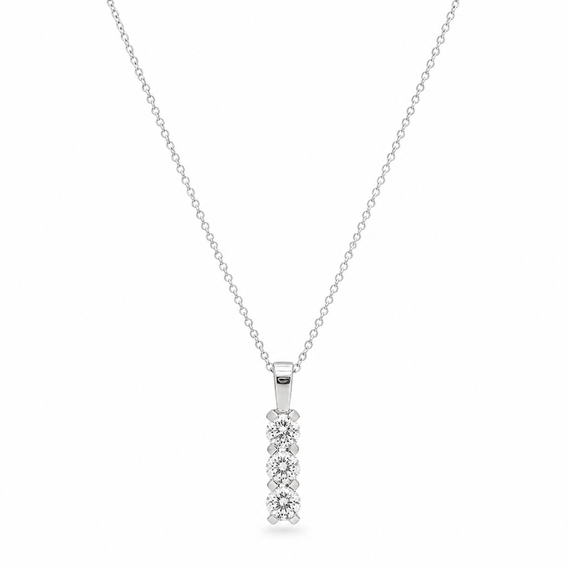 Elegant trilogy diamond pendant necklace from Appleby Jewellers Dublin showcasing three sparkling diamonds on a delicate chain.