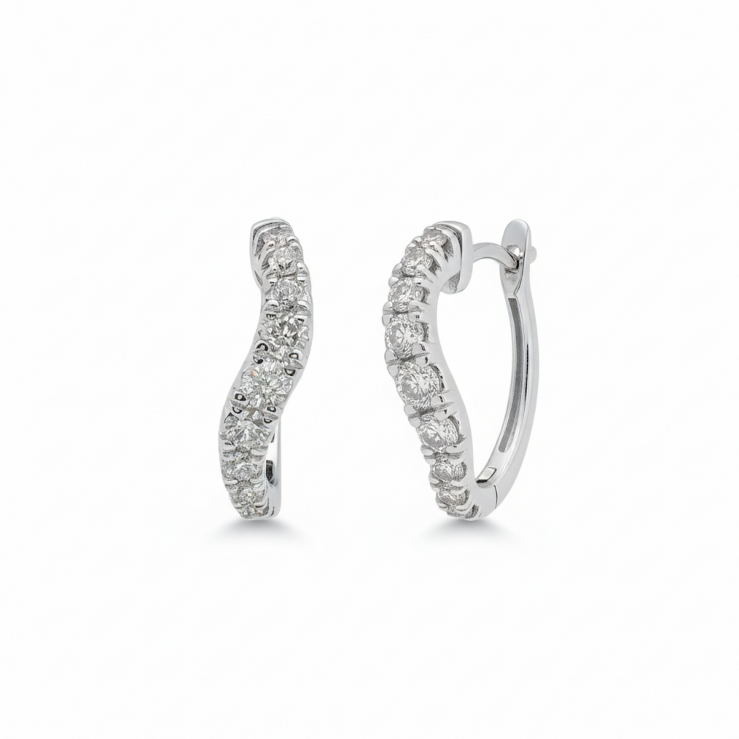 Elegant wave diamond earrings in 18ct white gold featuring sparkling diamonds, designed by Appleby Jewellers Dublin.