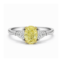 Elegant yellow diamond ring by Appleby Jewellers Dublin featuring a stunning fancy intense yellow diamond on a sleek band.
