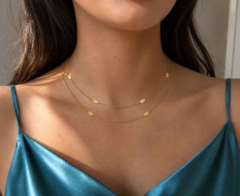 Double strand necklace, bracelet, and earrings set from Appleby Jewellers Dublin featuring elegant jewelry with matching design.