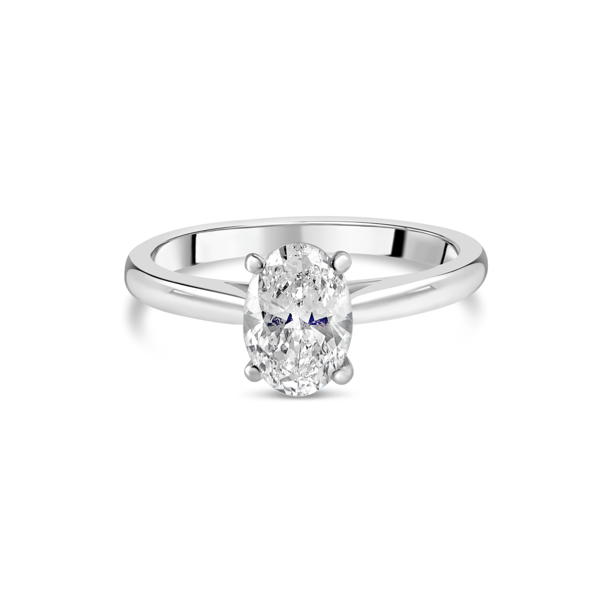 Diamond oval engagement ring with a sleek band from Appleby Jewellers Dublin, showcasing detailed craftsmanship and sparkling stones.