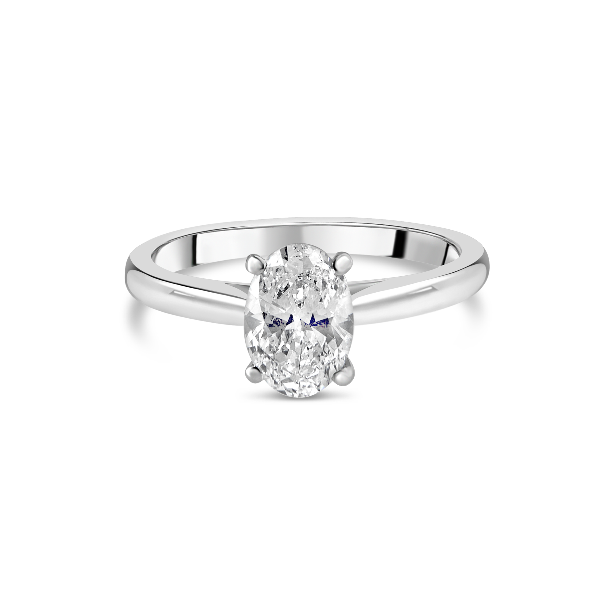 Diamond oval engagement ring with a sleek band from Appleby Jewellers Dublin, showcasing detailed craftsmanship and sparkling stones.