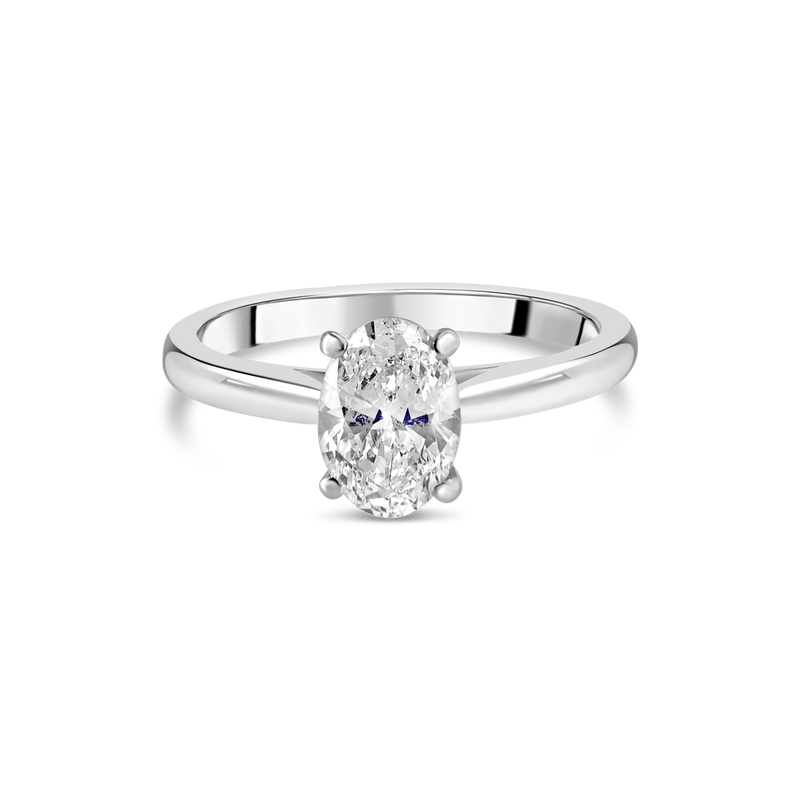 Diamond oval engagement ring with a sleek band from Appleby Jewellers Dublin, showcasing detailed craftsmanship and sparkling stones.